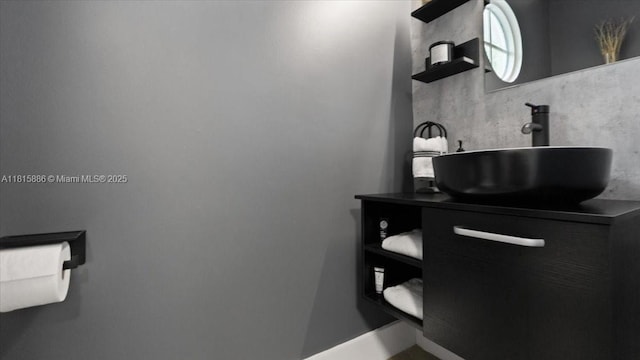 18701 Shauna Manor Dr, Boca Raton, FL 33496 - bathroom with vanity and baseboards