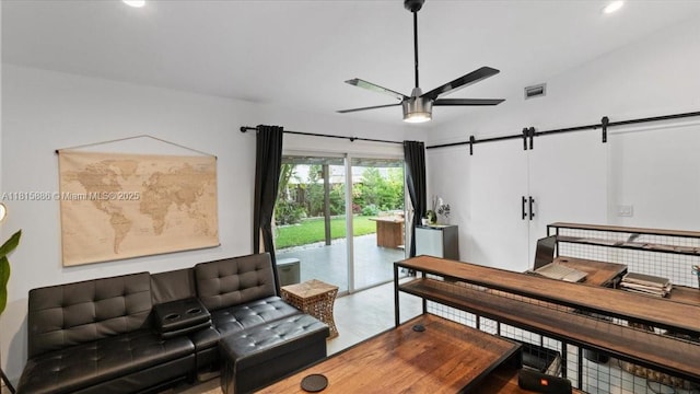 18701 Shauna Manor Dr, Boca Raton, FL 33496 - living room with a ceiling fan, a barn door, and recessed lighting