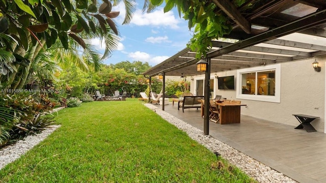 18701 Shauna Manor Dr, Boca Raton, FL 33496 - view of grassy yard featuring a patio area and an outdoor living space