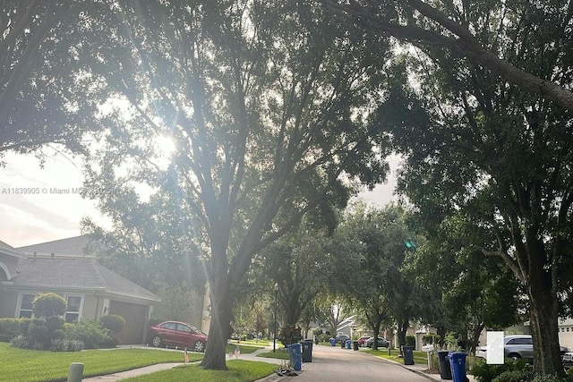 7111 Colony Pointe Dr, Riverview, FL 33578 - view of asphalt road featuring curbs and sidewalks