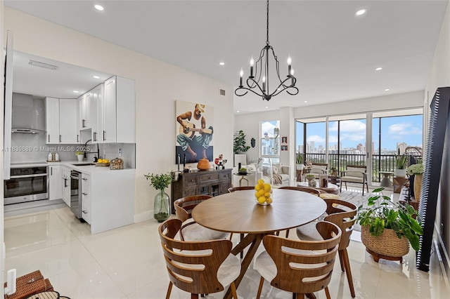20379 W Country Club Dr Unit Ph38, Aventura, FL 33180 - dining area with recessed lighting, a chandelier, and light tile patterned floors