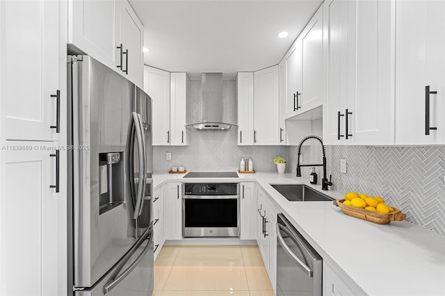 20379 W Country Club Dr Unit Ph38, Aventura, FL 33180 - kitchen with stainless steel appliances, wall chimney exhaust hood, light tile patterned floors, light countertops, and white cabinets
