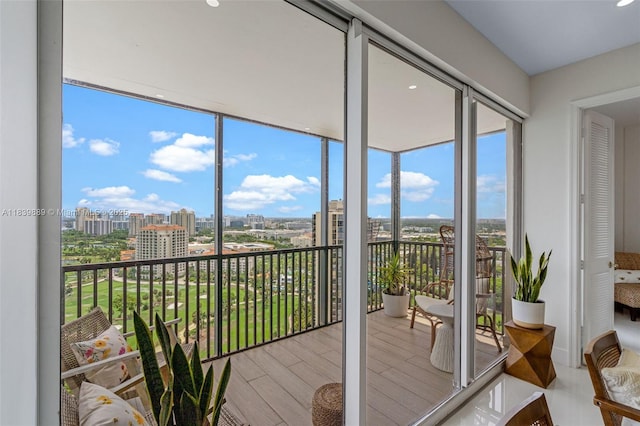 20379 W Country Club Dr Unit Ph38, Aventura, FL 33180 - sunroom featuring a view of city