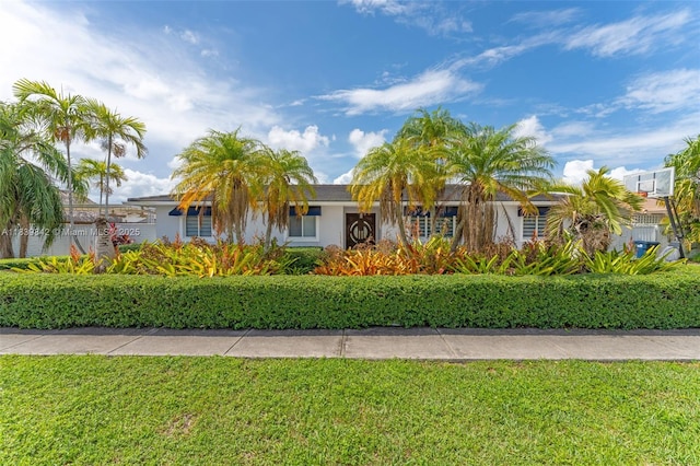 13305 SW 22nd Ter, Miami, FL 33175 - view of front of property with a front yard and stucco siding