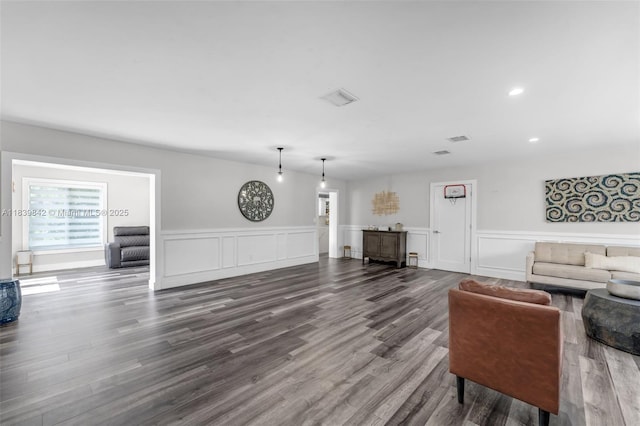 13305 SW 22nd Ter, Miami, FL 33175 - living room featuring dark wood-type flooring, a wainscoted wall, a decorative wall, and recessed lighting