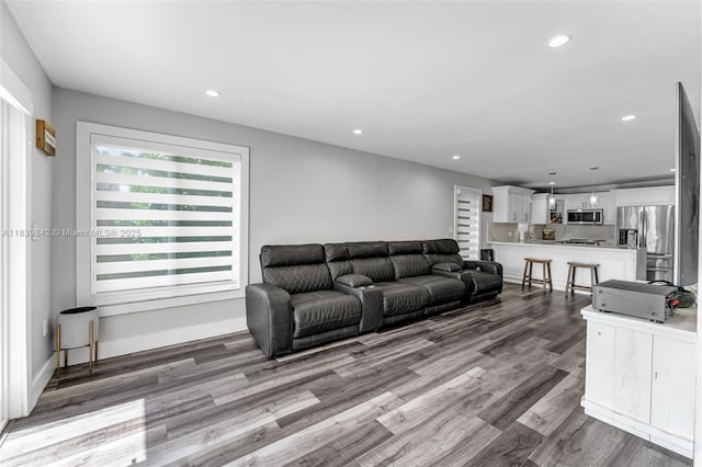 13305 SW 22nd Ter, Miami, FL 33175 - living area featuring wood finished floors and recessed lighting