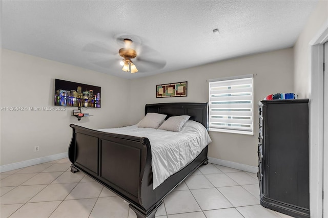 13305 SW 22nd Ter, Miami, FL 33175 - bedroom featuring a textured ceiling, a ceiling fan, and light tile patterned flooring
