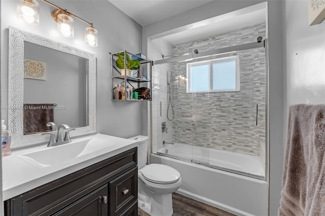 13305 SW 22nd Ter, Miami, FL 33175 - bathroom featuring vanity, wood finished floors, and enclosed tub / shower combo