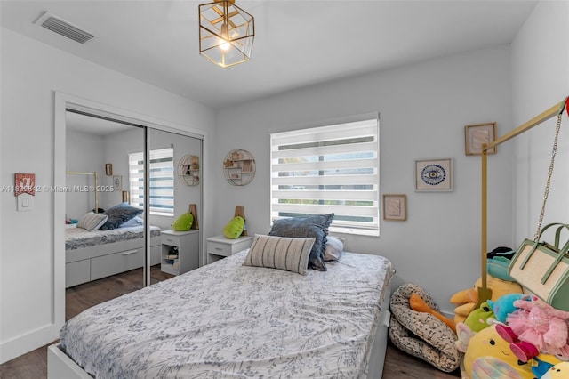 13305 SW 22nd Ter, Miami, FL 33175 - bedroom with dark wood-type flooring and a closet