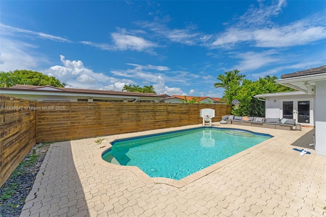 13305 SW 22nd Ter, Miami, FL 33175 - view of swimming pool with french doors, a patio area, and a fenced backyard