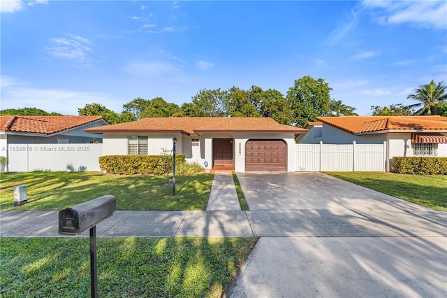 14213 SW 100th Ln, Miami, FL 33186 - view of front of property featuring a garage, driveway, and stucco siding
