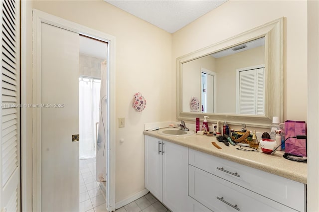 14213 SW 100th Ln, Miami, FL 33186 - bathroom with vanity and tile patterned floors