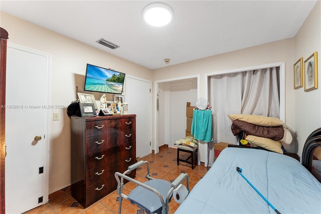14213 SW 100th Ln, Miami, FL 33186 - bedroom with light tile patterned flooring