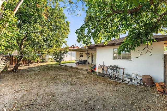14213 SW 100th Ln, Miami, FL 33186 - fenced backyard featuring a patio