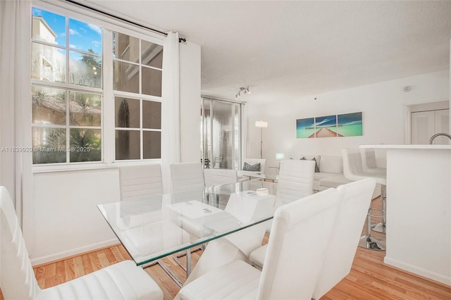 19701 E Country Club Dr Unit 5104, Aventura, FL 33180 - dining area featuring wood finished floors