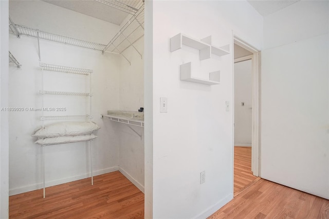 19701 E Country Club Dr Unit 5104, Aventura, FL 33180 - spacious closet featuring wood finished floors
