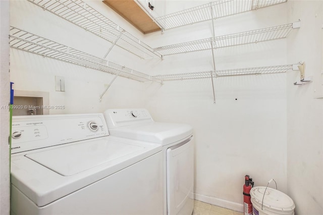19701 E Country Club Dr Unit 5104, Aventura, FL 33180 - washroom featuring washing machine and clothes dryer and baseboards