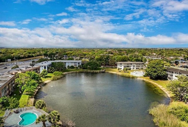 5335 NW 10th Ct Unit 208, Plantation, FL 33313 - drone / aerial view of a nearby body of water and a pool