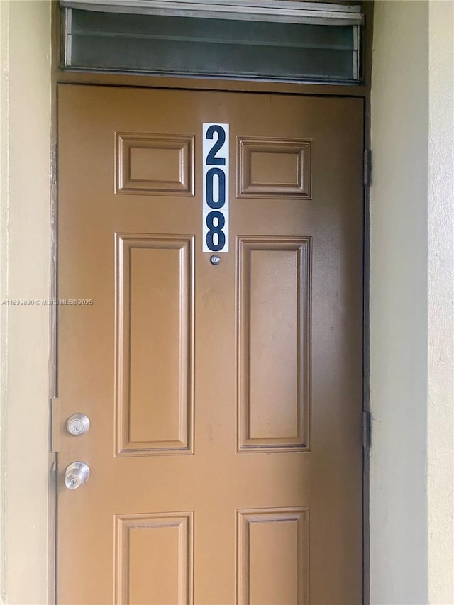 5335 NW 10th Ct Unit 208, Plantation, FL 33313 - view of exterior entry with stucco siding