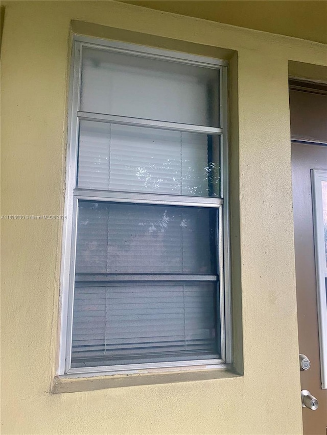 5335 NW 10th Ct Unit 208, Plantation, FL 33313 - exterior view of stucco siding