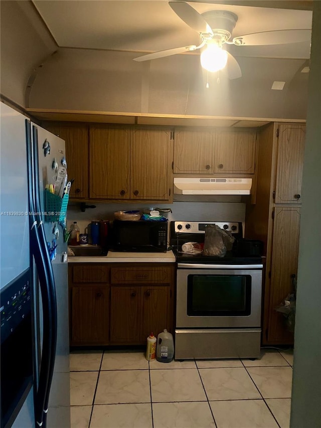 5335 NW 10th Ct Unit 208, Plantation, FL 33313 - kitchen with stainless steel electric range oven, fridge with ice dispenser, under cabinet range hood, black microwave, and ceiling fan
