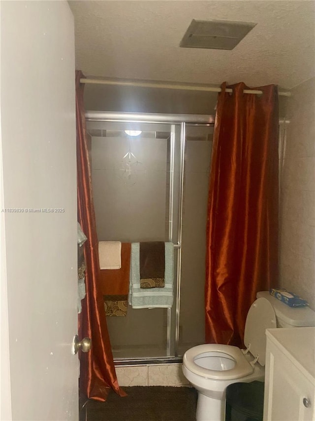 5335 NW 10th Ct Unit 208, Plantation, FL 33313 - bathroom featuring a shower stall, vanity, and tile patterned floors