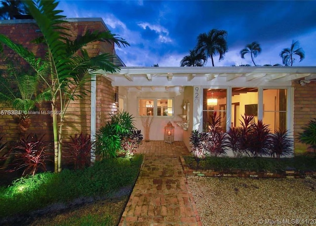 920 NE 72nd St, Miami, FL 33138 - view of front facade with stucco siding