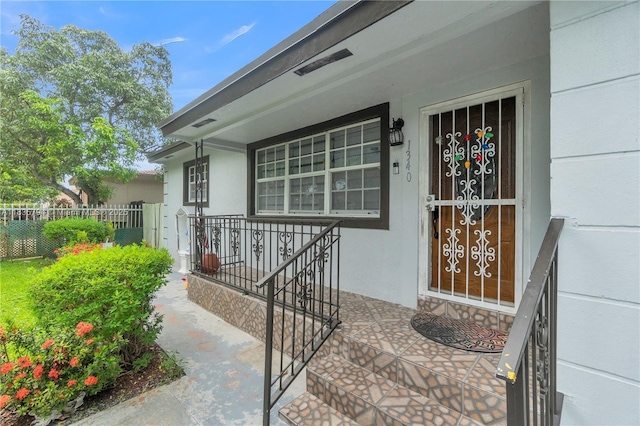 1340 NW 128th St, North Miami, FL 33167 - doorway to property featuring covered porch
