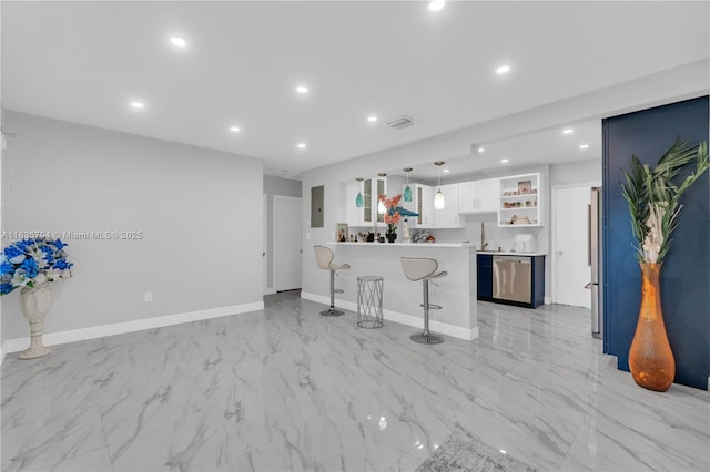 1340 NW 128th St, North Miami, FL 33167 - kitchen featuring appliances with stainless steel finishes, open shelves, a kitchen bar, light marble finish floors, and a peninsula