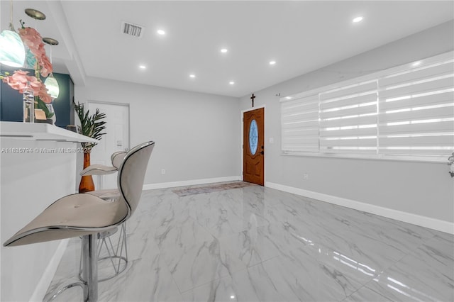 1340 NW 128th St, North Miami, FL 33167 - foyer entrance featuring light marble finish floors and recessed lighting