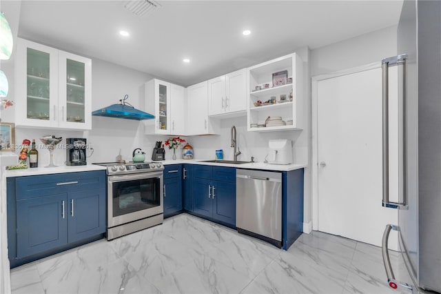 1340 NW 128th St, North Miami, FL 33167 - kitchen with stainless steel appliances, blue cabinets, light marble finish flooring, open shelves, and light countertops