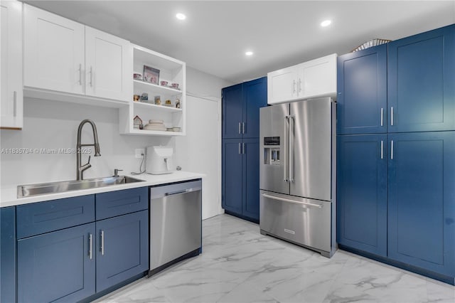 1340 NW 128th St, North Miami, FL 33167 - kitchen featuring appliances with stainless steel finishes, blue cabinets, light marble finish floors, open shelves, and recessed lighting