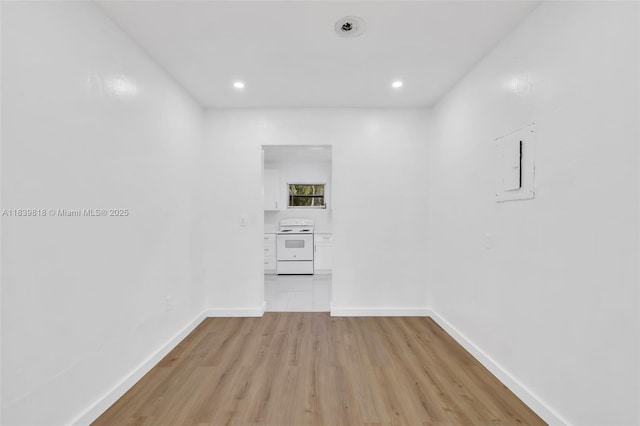 1315 NE 146th St, Miami, FL 33161 - spare room featuring light wood-style flooring and recessed lighting