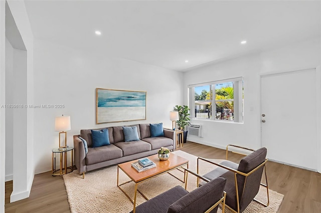 1315 NE 146th St, Miami, FL 33161 - living area featuring light wood-style floors, recessed lighting, and a wall mounted AC