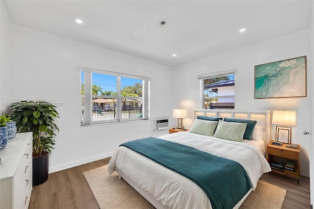 1315 NE 146th St, Miami, FL 33161 - bedroom featuring wood finished floors, recessed lighting, and a wall mounted AC