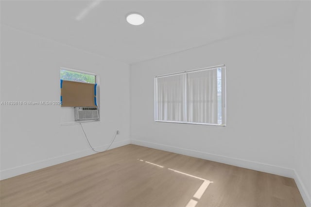 1315 NE 146th St, Miami, FL 33161 - unfurnished room with wood finished floors and cooling unit