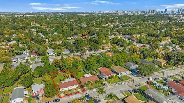 1315 NE 146th St, Miami, FL 33161 - aerial overview of property's location featuring property parcel outlined and a tree filled landscape