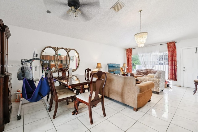 3120 NW 203rd Ter, Miami Gardens, FL 33056 - dining space with a ceiling fan, a chandelier, and a textured ceiling