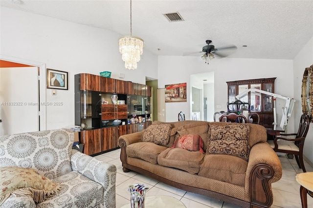 3120 NW 203rd Ter, Miami Gardens, FL 33056 - living area with ceiling fan, lofted ceiling, a chandelier, and light tile patterned floors