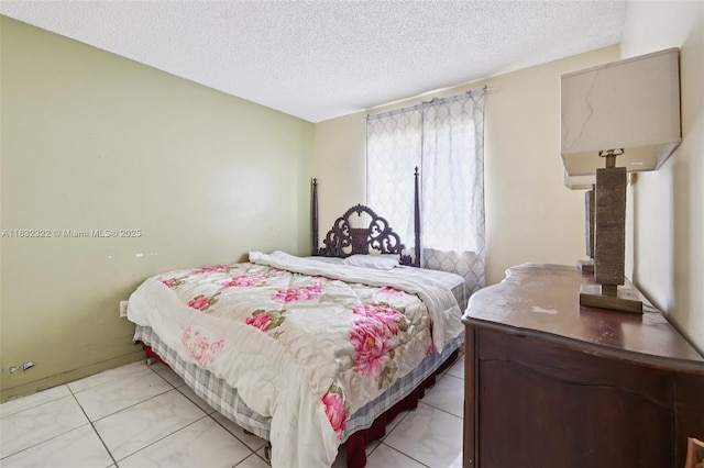 3120 NW 203rd Ter, Miami Gardens, FL 33056 - bedroom with a textured ceiling and light marble finish flooring