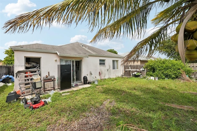 3120 NW 203rd Ter, Miami Gardens, FL 33056 - rear view of house with stucco siding and a shingled roof