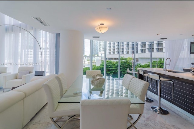 200 Biscayne Boulevard Way Unit 502, Miami, FL 33131 - dining space with light marble finish flooring