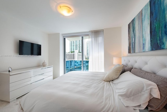 200 Biscayne Boulevard Way Unit 502, Miami, FL 33131 - bedroom featuring access to outside