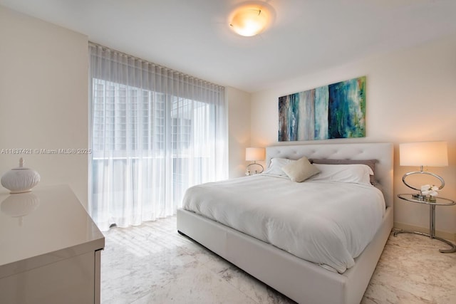 200 Biscayne Boulevard Way Unit 502, Miami, FL 33131 - bedroom with light marble finish floors
