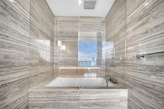 18975 Collins Ave Unit 1105, Sunny Isles Beach, FL 33160 - bathroom with a shower with shower door and a tub with marble appearance