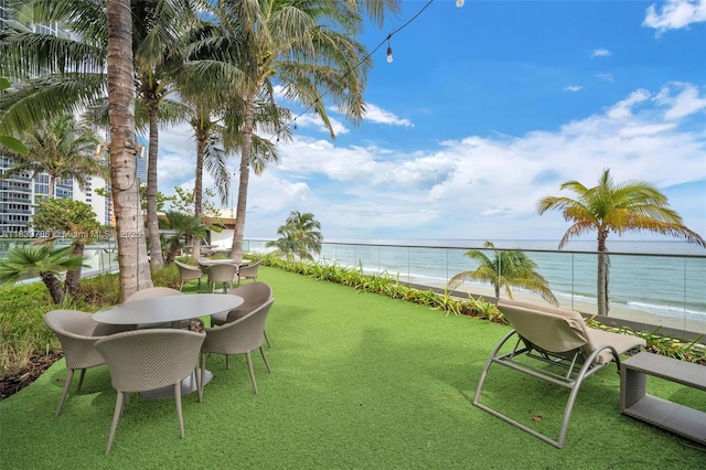 18975 Collins Ave Unit 1105, Sunny Isles Beach, FL 33160 - view of grassy yard featuring view of water and beach