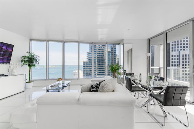 485 Brickell Ave Unit 2908, Miami, FL 33131 - living room with expansive windows, a water view, tile patterned floors, and a view of city