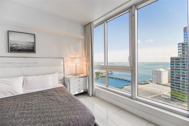 485 Brickell Ave Unit 2908, Miami, FL 33131 - unfurnished bedroom featuring a water view and tile patterned floors