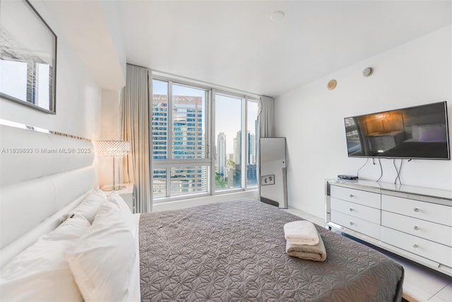 485 Brickell Ave Unit 2908, Miami, FL 33131 - bedroom featuring baseboards