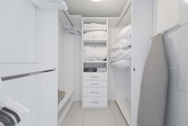 485 Brickell Ave Unit 2908, Miami, FL 33131 - walk in closet with light tile patterned flooring
